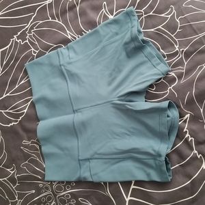 Athleta Salutation Stash Pocket, 5" size medium.